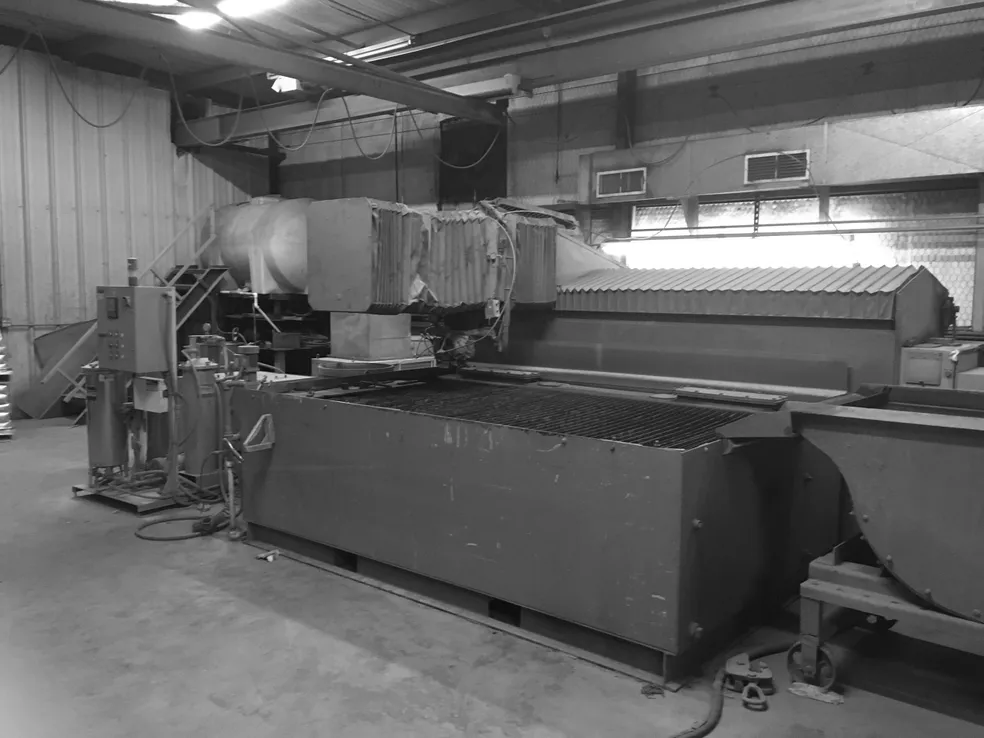 side view of water jet machine shop